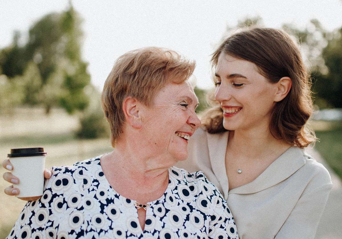 young woman sharing a moment relative that survived cancer