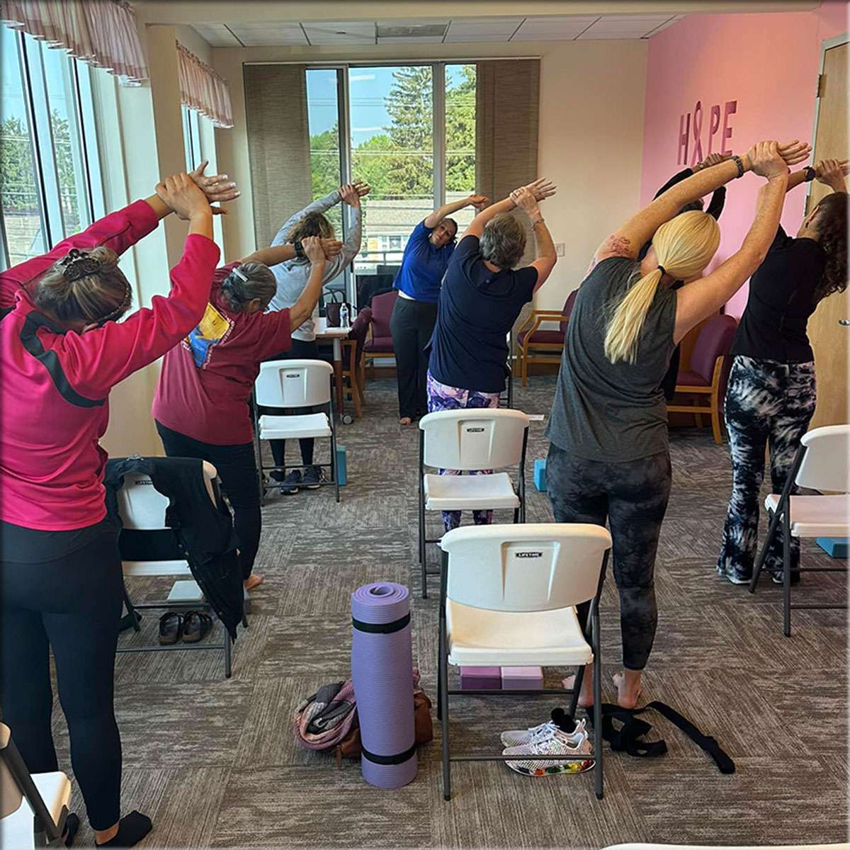 group of women in yoga class